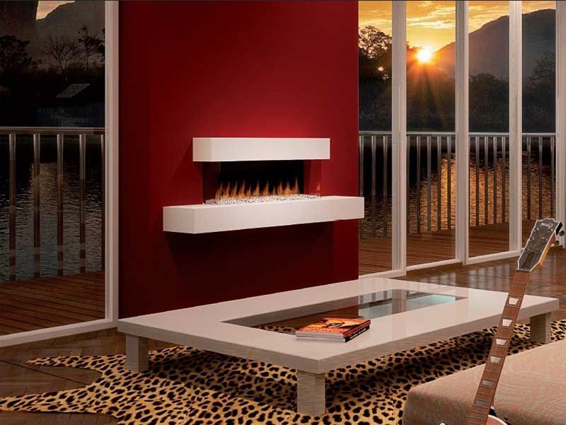 rote wand wandkamin leopardenteppich glasfront sonnenuntergang